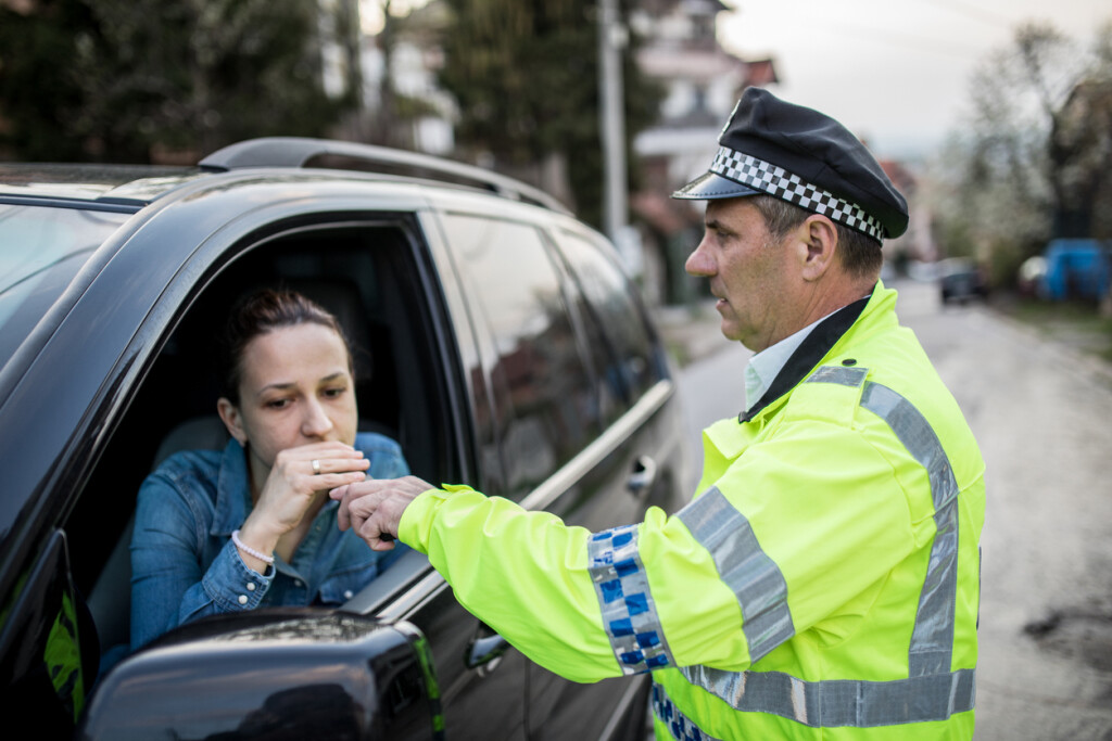 Traffic police officer stopped woman for alcohol test